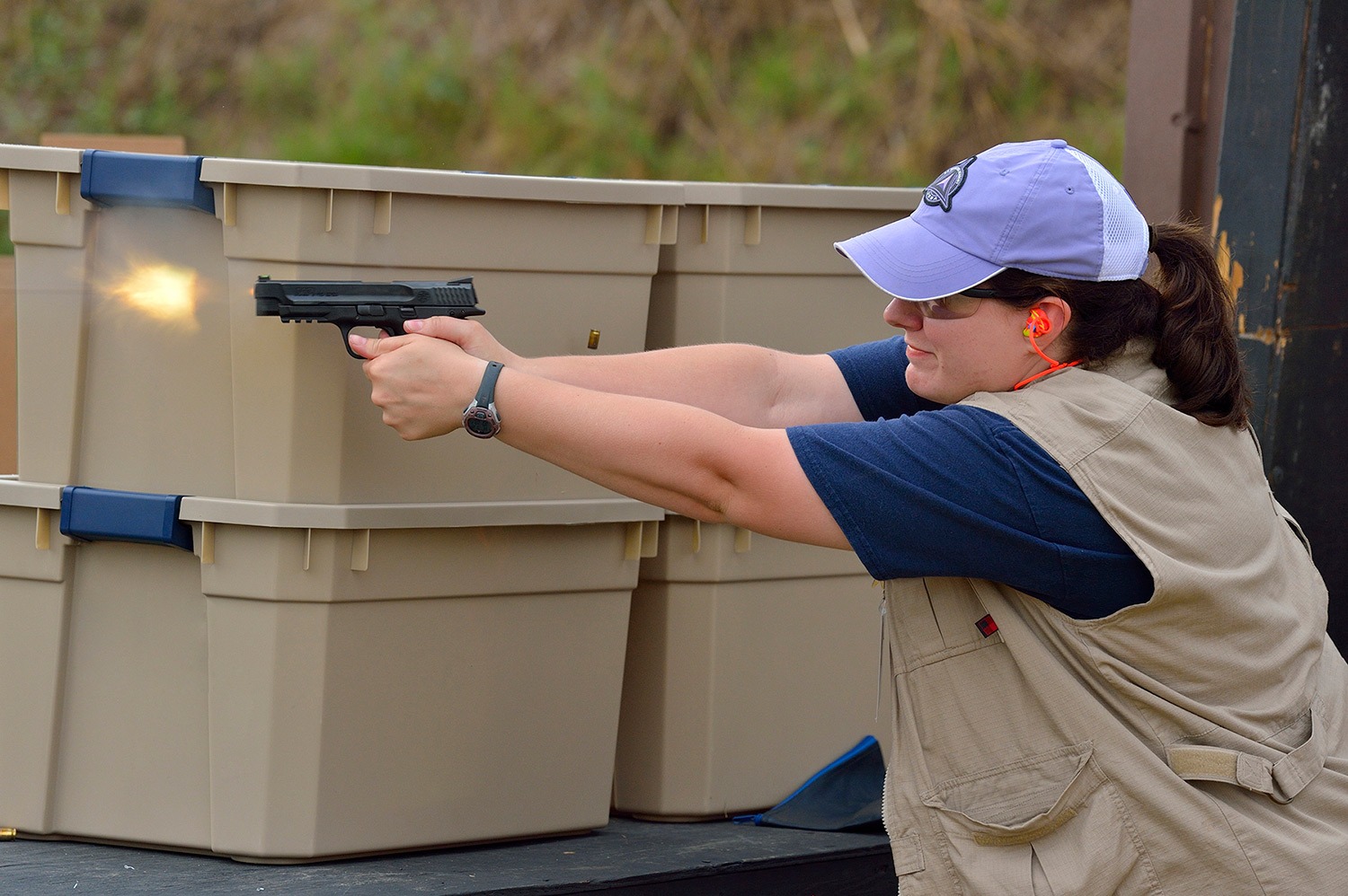 Woman shooting handgun