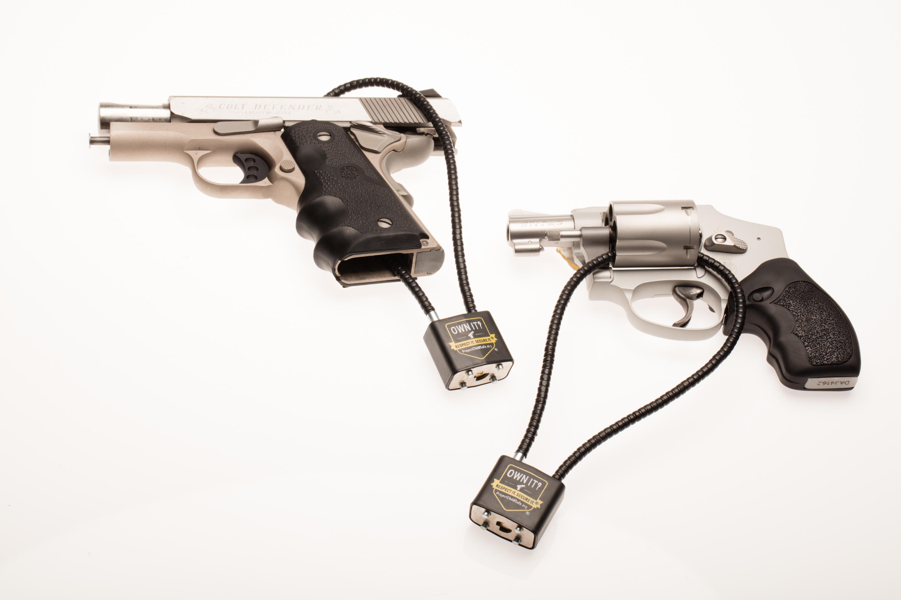 Handguns with Project ChildSafe cable locks