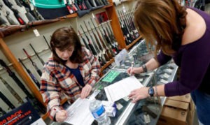 Women purchasing Gun from New York store