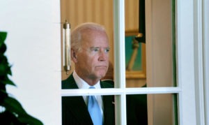 President Joe Biden looking out window
